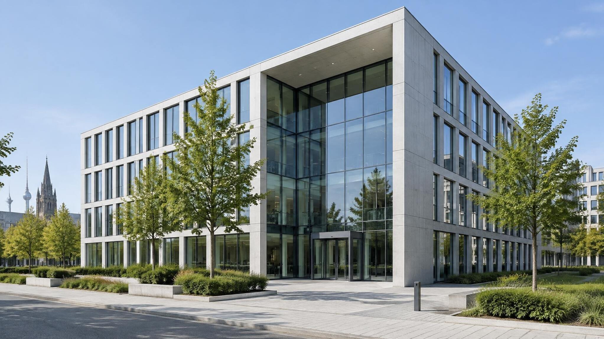 Modern glass office building exterior on a city street in Germany
